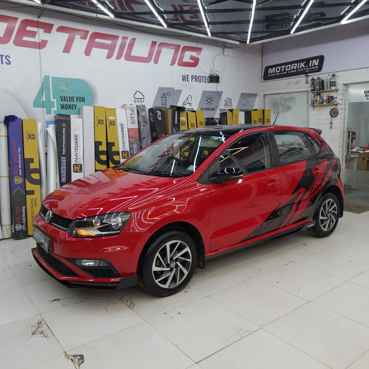 Stylish abstract Hatchback car side graphics on a red hatchback by Motorik Detailing