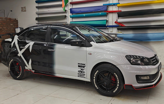 Stylish ARROW X car graphics on a modified sedan with a sleek design and sporty accents