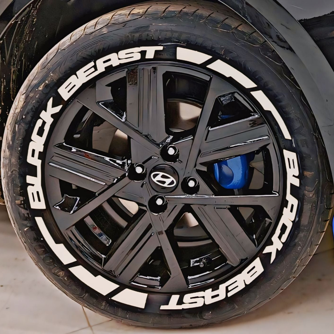 Black Beast tyre Stickers on a sleek black alloy wheel for stylish vehicle enhancement