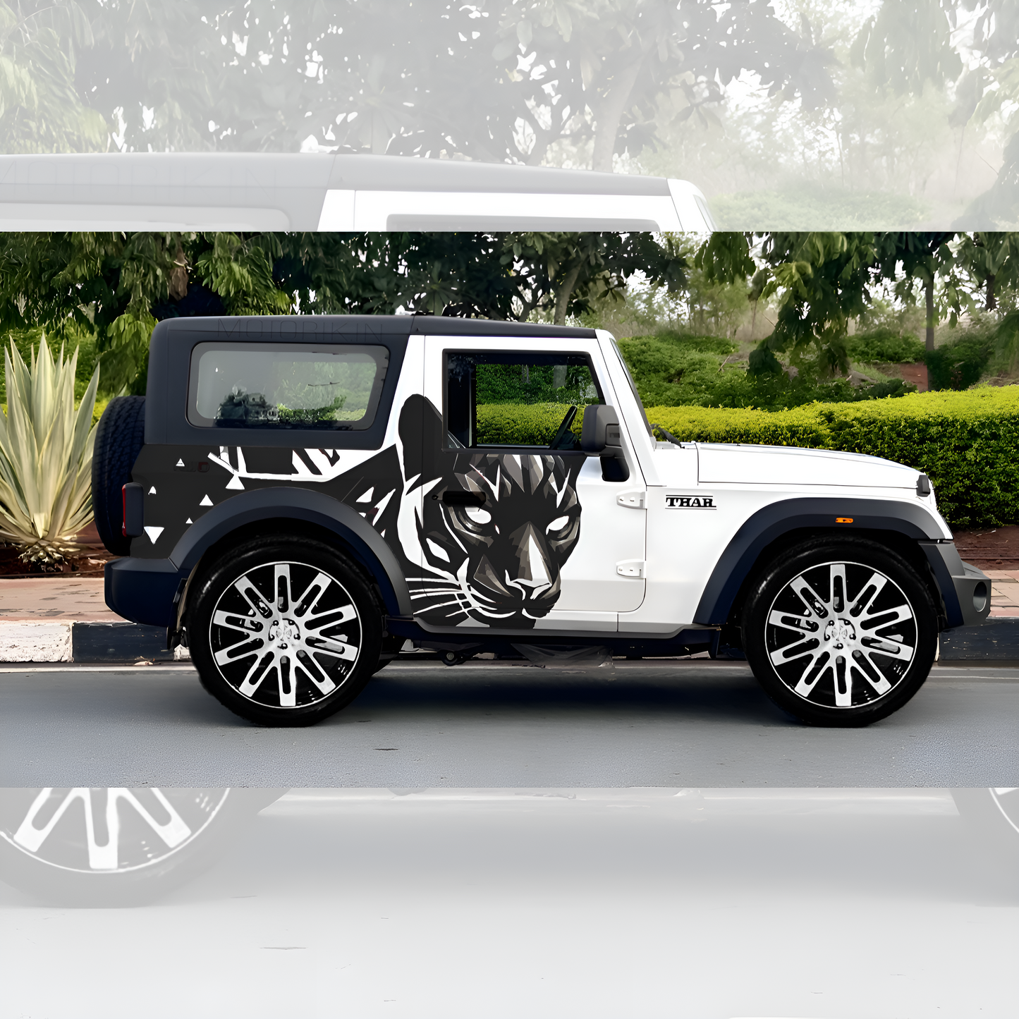 Stylish white SUV featuring striking black panther car graphics for a unique look