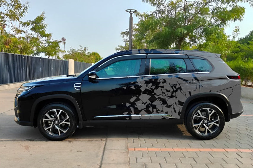 Stylish car distortion graphics Hatchback Car applied to a sleek black vehicle for enhanced visual appeal