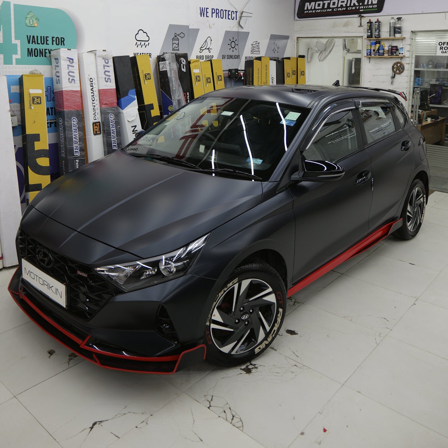 Five Metal splitters for Hyundai in red and black design showcasing sleek automotive styling