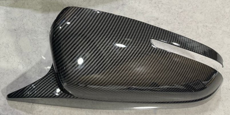 Hyundai Verna 2023 mirror cover in sleek carbon fiber design for enhanced style and protection