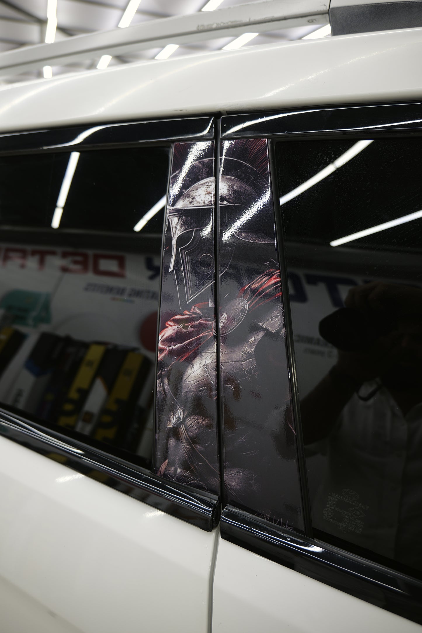 Iron Samurai car graphics displayed on a vehicle window for a bold and unique look