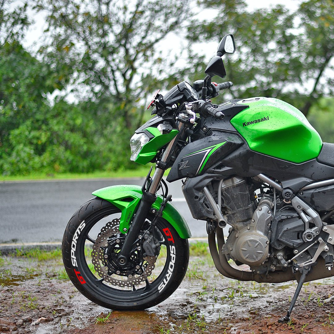 Kawasaki sports bike featuring GT sports bike tyre sticker on the front tyre for enhanced styling