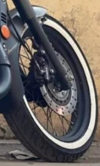 Bike tyre stickers on a motorcycle wheel showcasing a sleek design for enhanced style