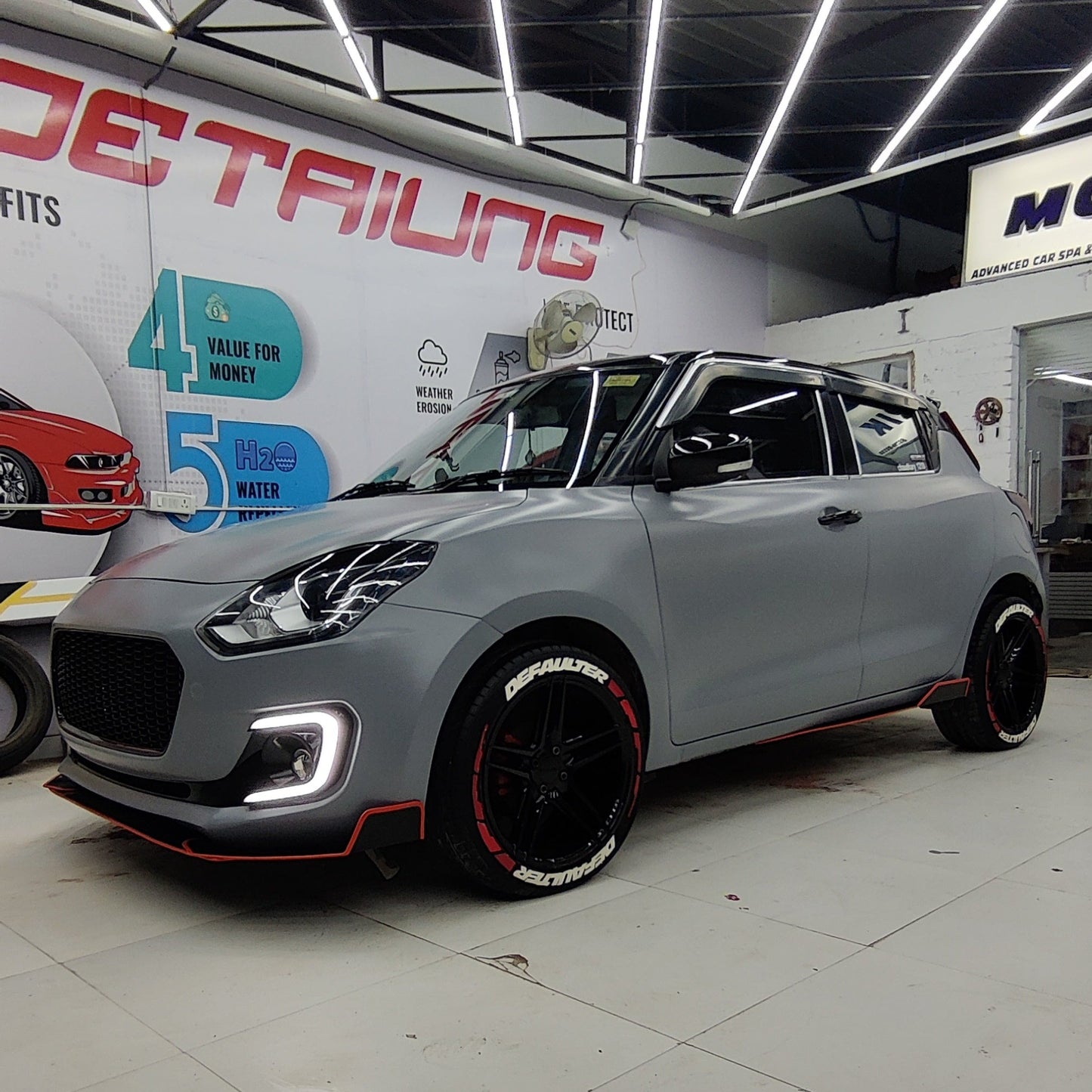 Defaulter car tyre Sticker on stylish modified car with sleek design and bold accents