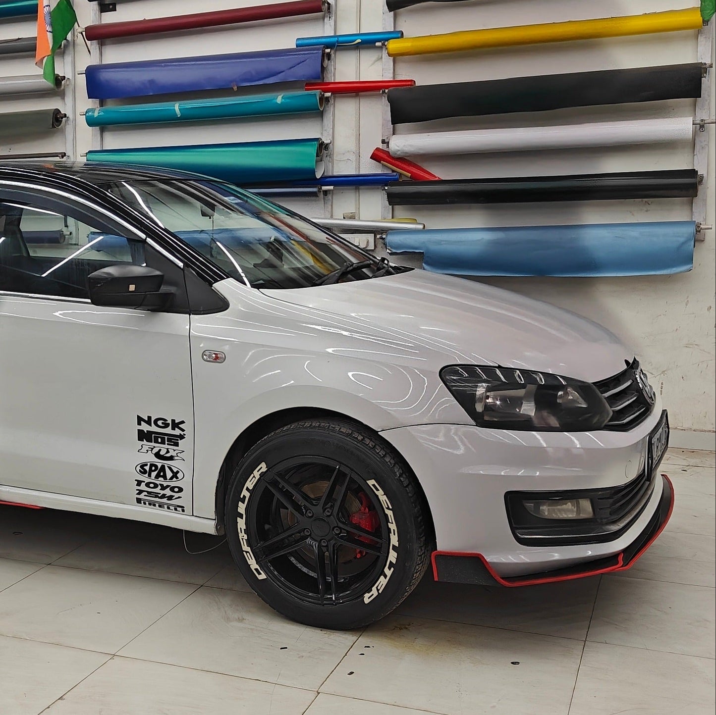 Defaulter tyre sticker on a modified car with sleek design and bold graphics for enhanced style
