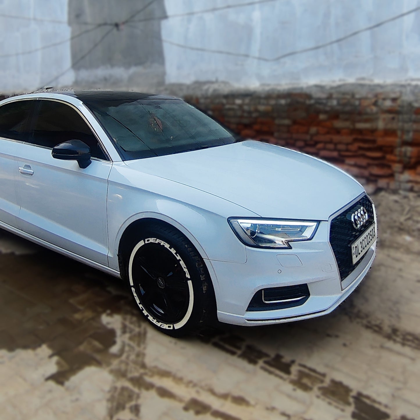 Audi A3 with Motorik DEFAULTER tyre stickers enhancing its sporty look and style