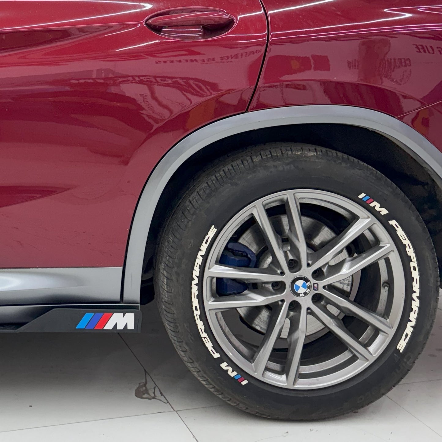M Performance tire stickers on BMW with stylish alloy wheels for an enhanced look