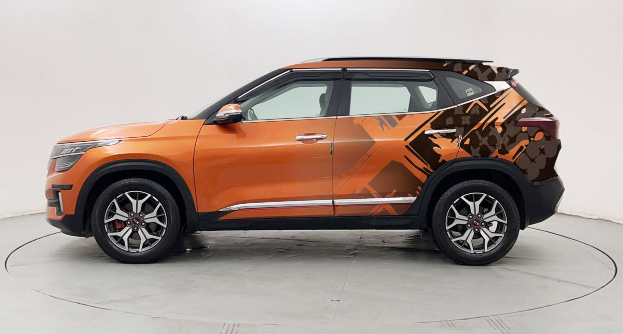 Motorik Multi-X graphics on an orange SUV showcasing a modern design for personalized vehicle styling