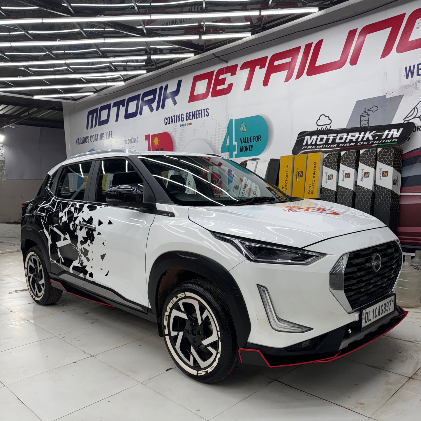 Nissan car splitters set featuring five pieces for enhanced aerodynamics and style