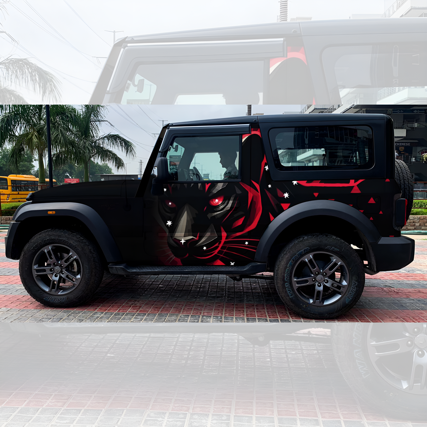 SUV with RED Black Panther car graphics featuring a striking design on a black exterior