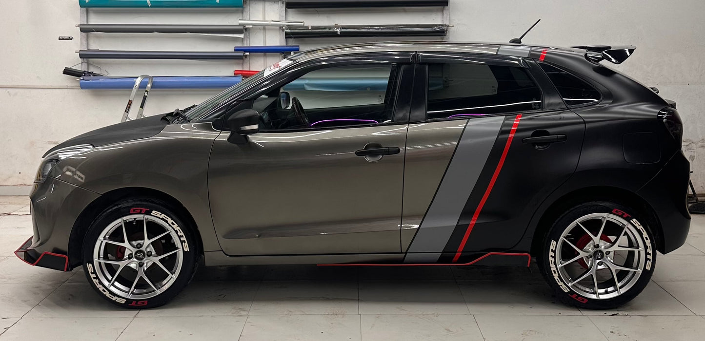 Suzuki front and side splitters installed on sleek grey car with sporty wheels and vibrant decals