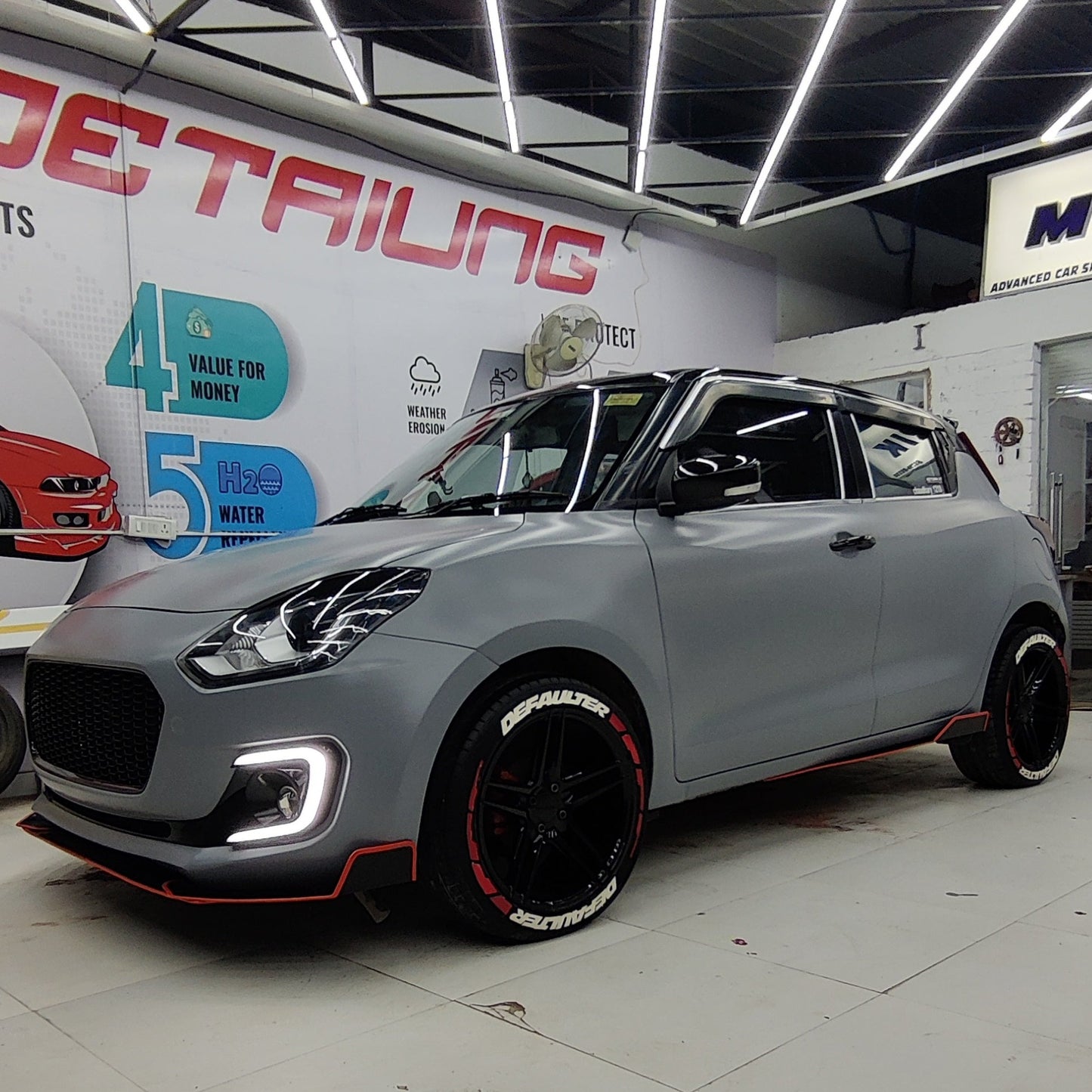 Suzuki front and side splitters for enhanced aerodynamics on a modified Suzuki car