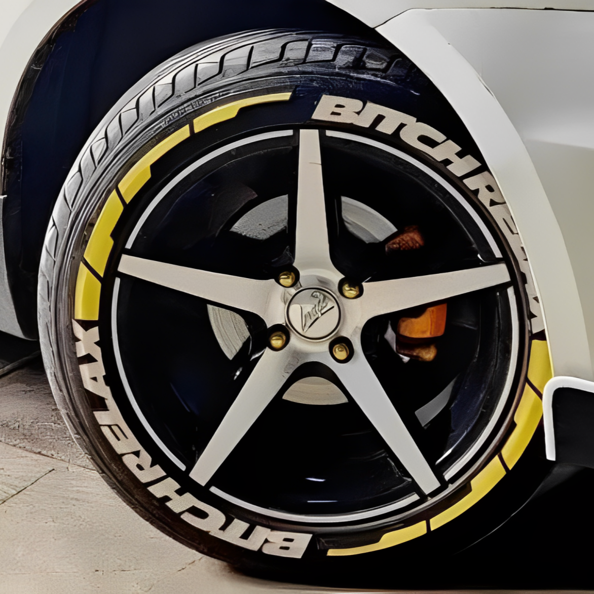 Stylish wheel tyre stickers set in yellow on black alloy wheels for a sporty look