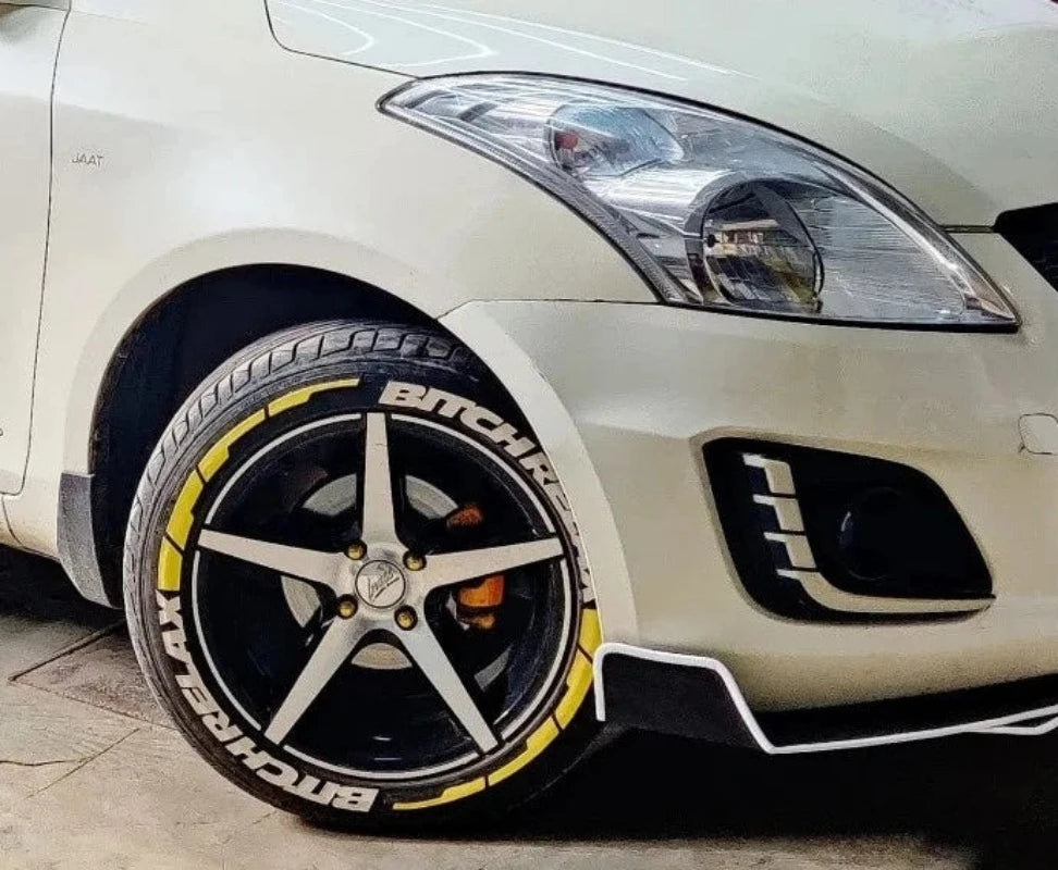 Set of wheel tyre stickers on a black alloy wheel for car customization and style