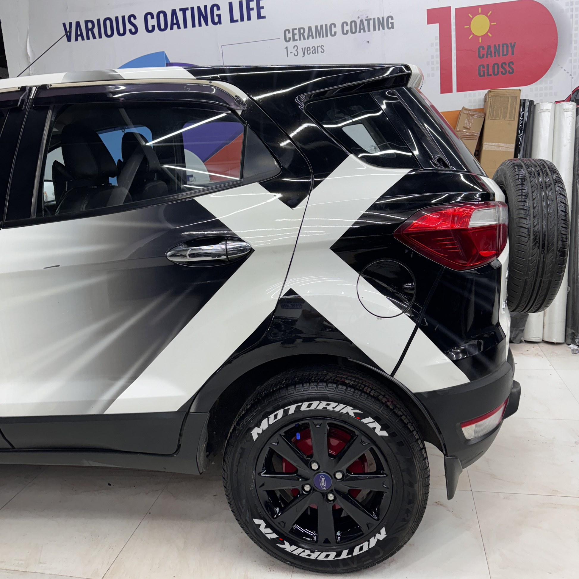 Custom car with Big x custom car graphic wraps showcasing sleek design and modern styling