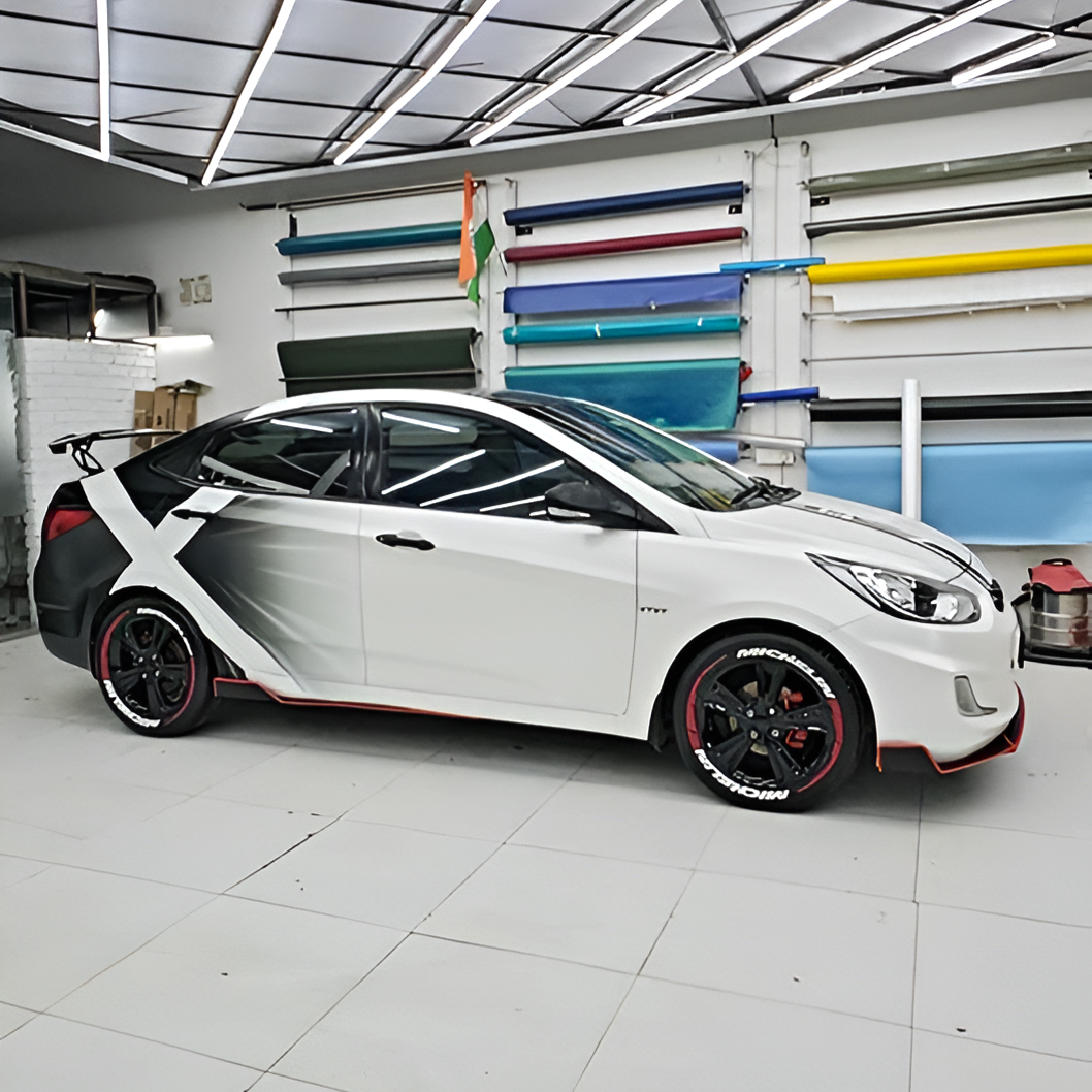 Customized white car with Big x custom car graphic wraps showcasing a sleek design and vibrant colors