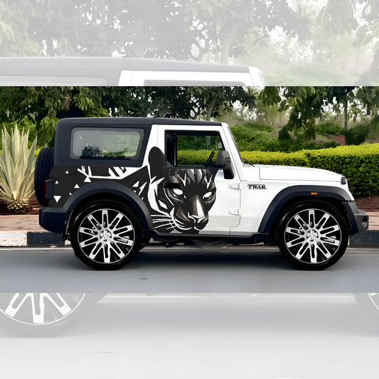Stylish white SUV featuring striking black panther car graphics for a unique look