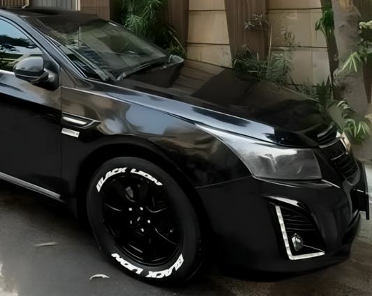Blacklion tyre sticker on a sleek black car with stylish alloy wheels