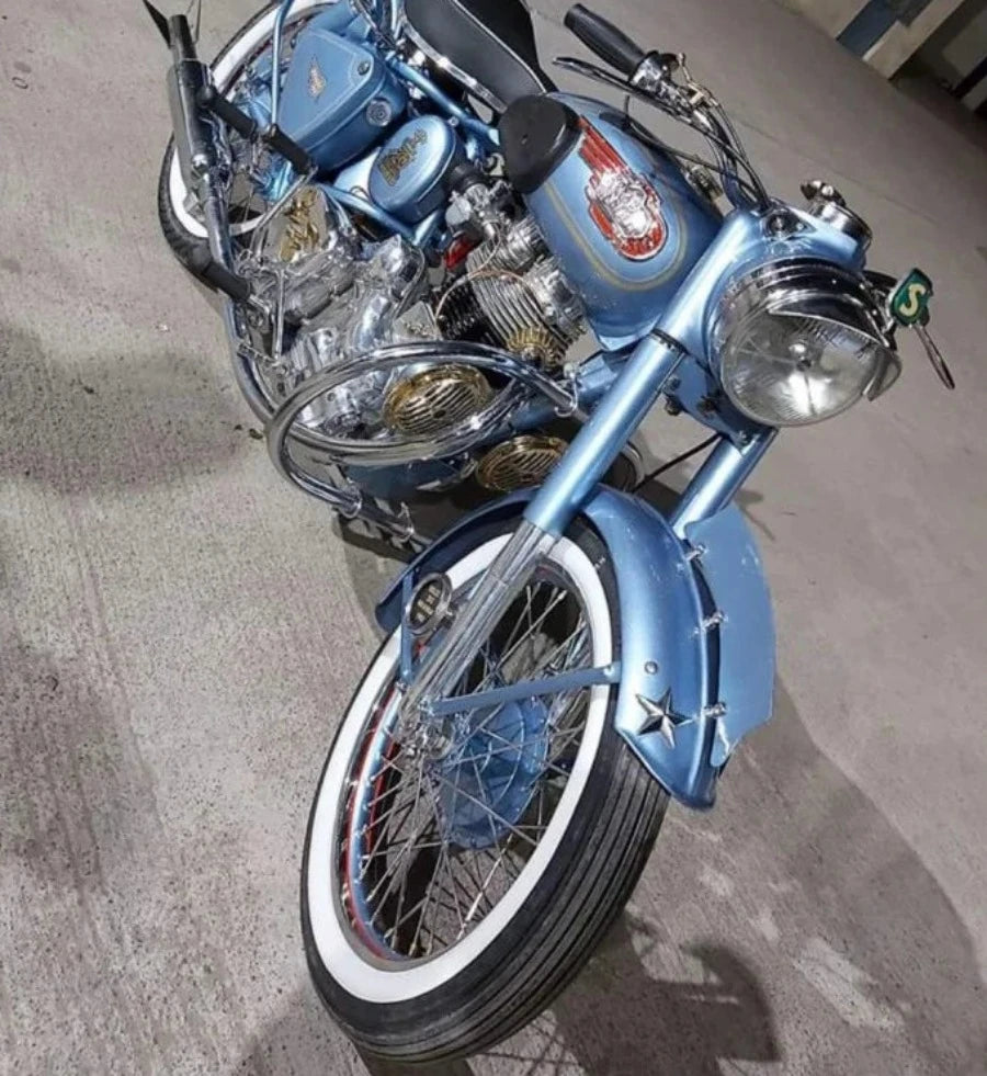 Motorik Detailing bike tyre stickers permanent on a classic blue motorcycle with chrome accents