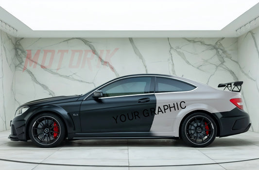 Custom car side graphics on a sleek sedan showcasing a modern two-tone finish