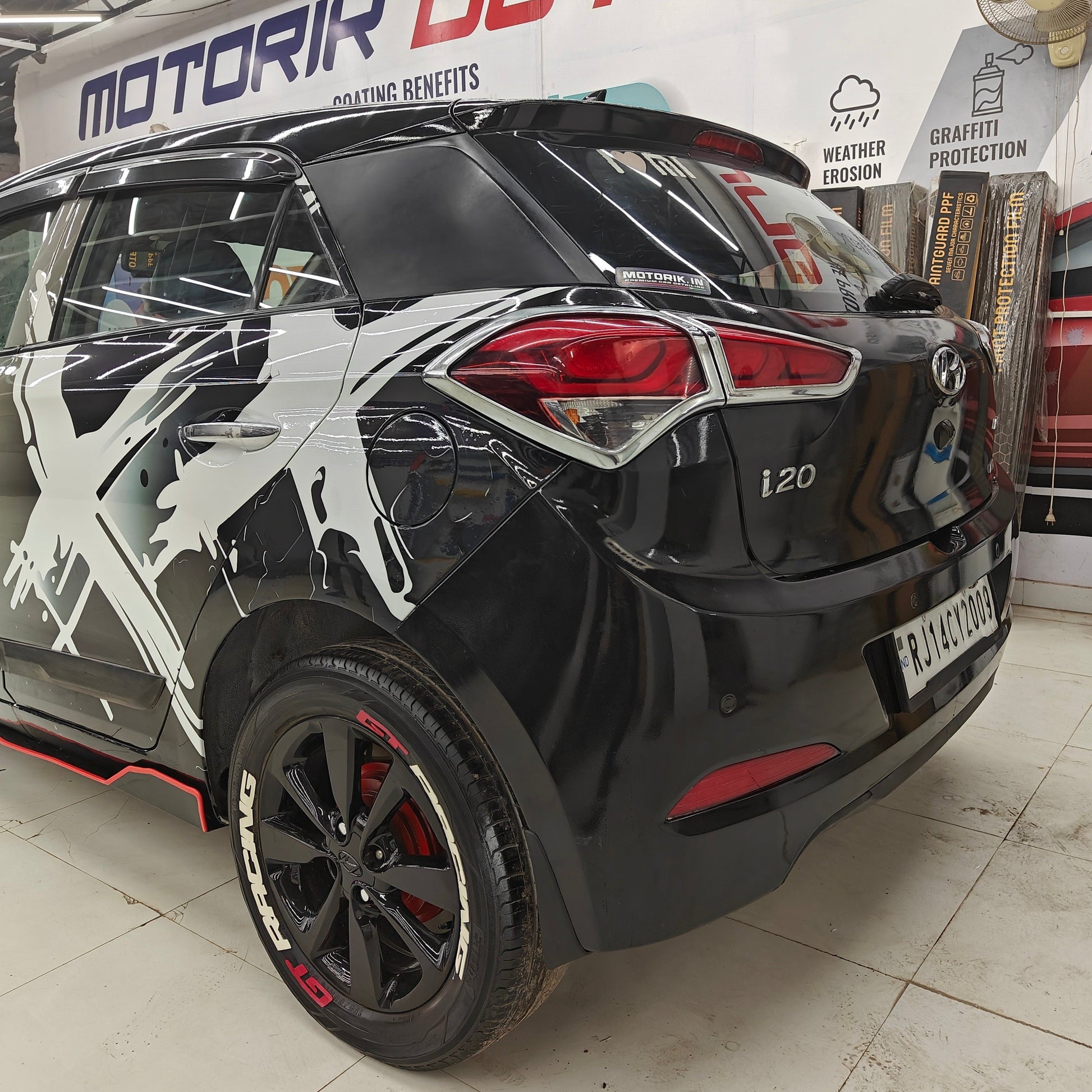 Stylish black vehicle with double X graphics for vehicles, enhancing its visual appeal and sporty look