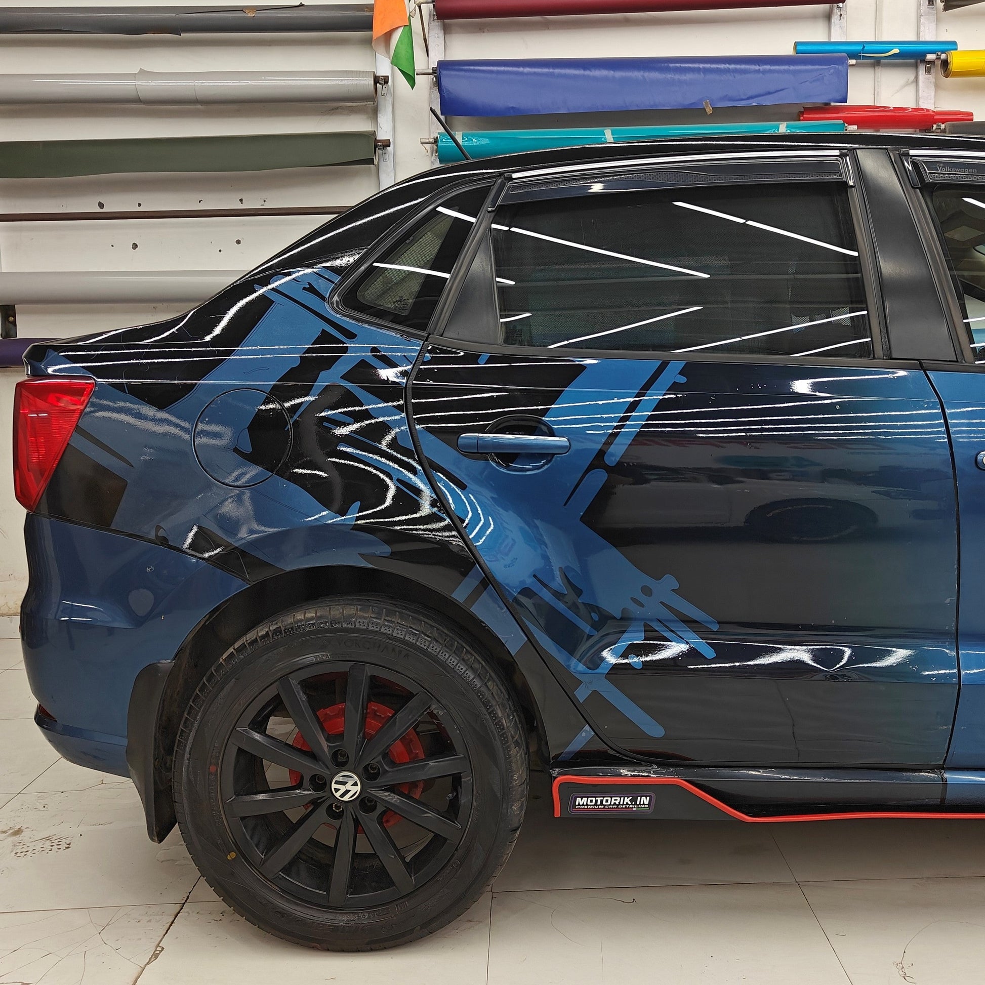 Stylish blue vehicle featuring double X graphics for vehicles by Motorik Detailing