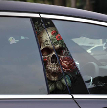 Gothic skull car graphics featuring a detailed skull design with flowers on a car window