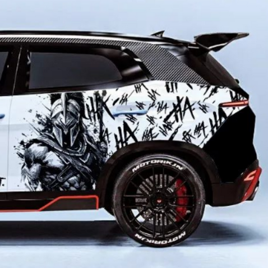 Motorik Detailing WARRIOR color fade-resistant decals on a custom car wrap with a bold design