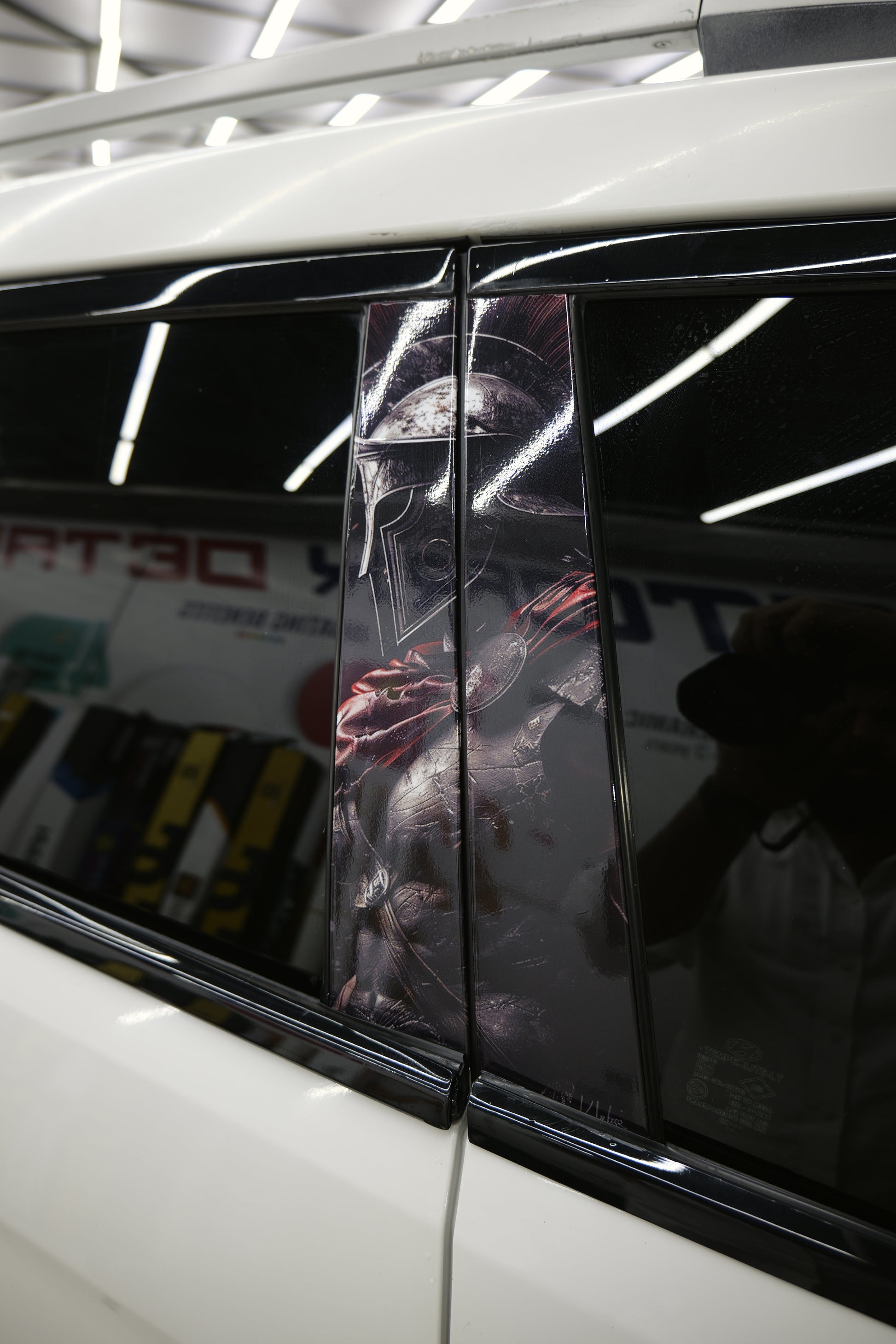 Iron Samurai car graphics displayed on a vehicle window for a bold and unique look