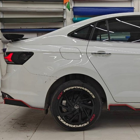 Metal car skirtings set by Motorik Detailing on a sleek white sedan with custom wheels