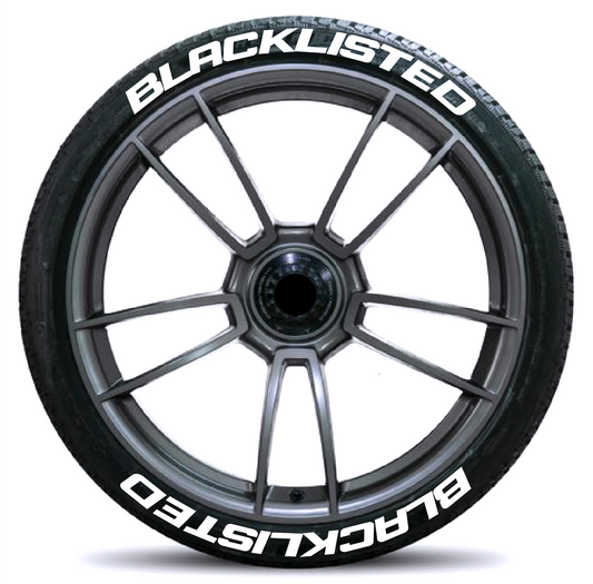 Blacklisted Car Tyre Stickers on a sleek alloy wheel for automotive customization