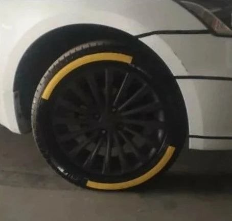 Durable rubber tyre decals in yellow on a sleek black car wheel for enhanced style