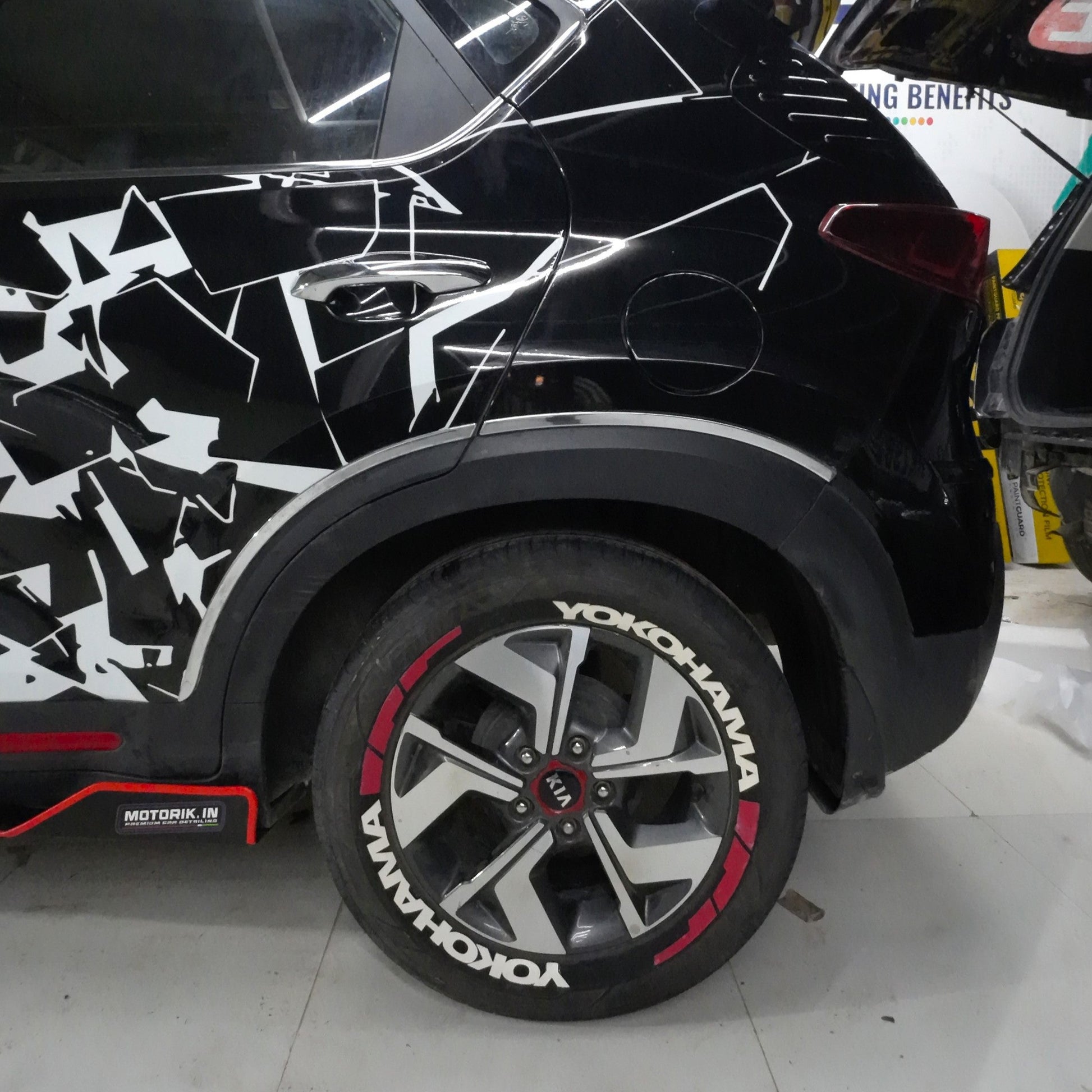 Motorik Detailing Tyre Sticker on Yokohama Tire with Bold Red and Black Design on Vehicle