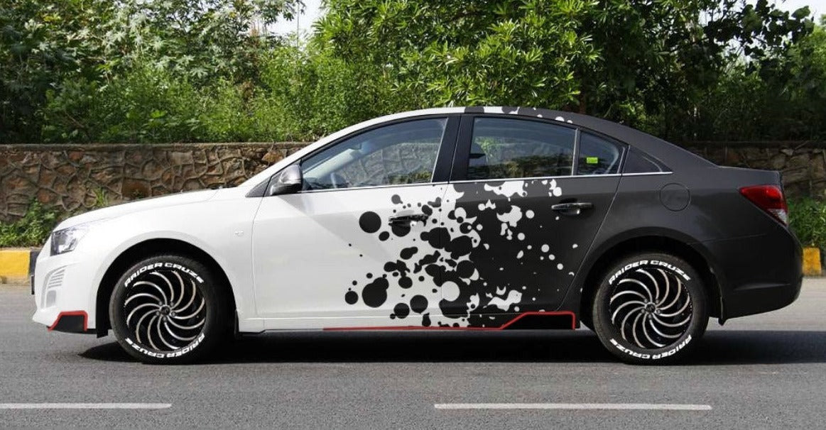 Stylish car featuring particle distortion car graphics on the side with modern design elements