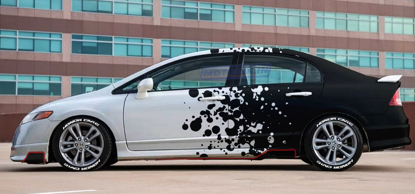 Unique particle distortion car graphics in black and white design on a modified sedan