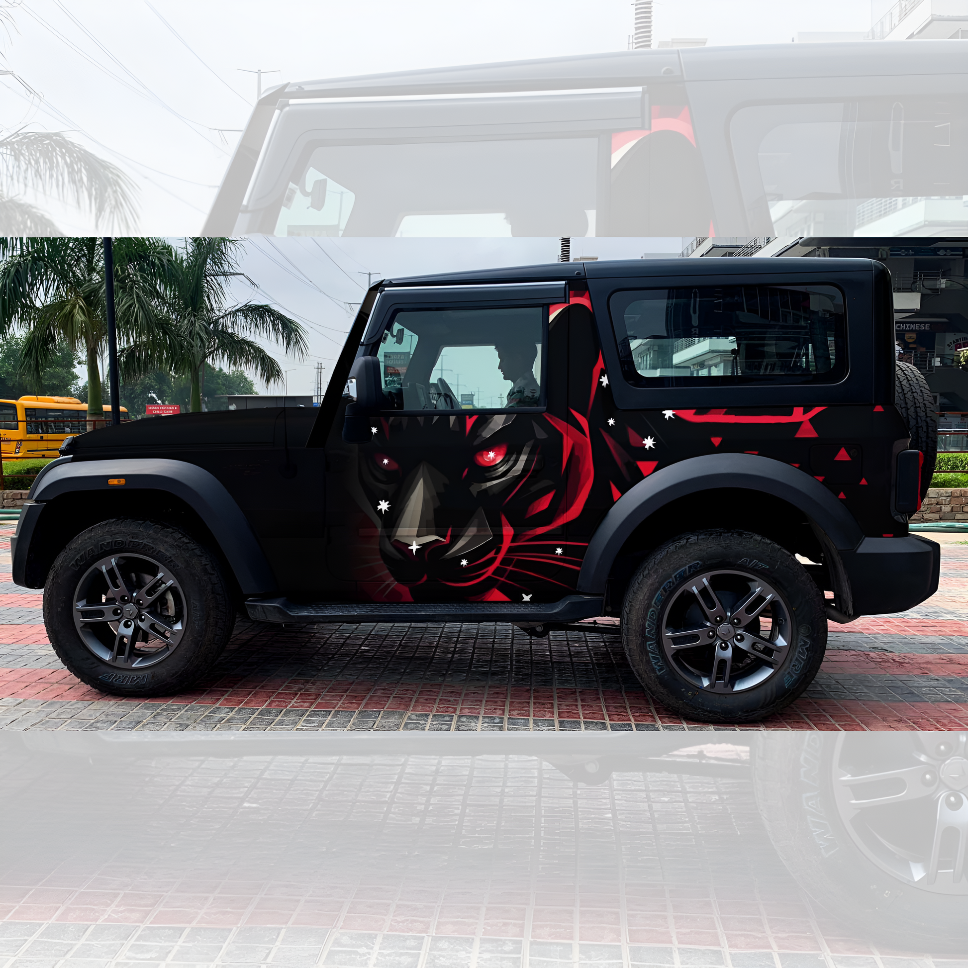SUV with RED Black Panther car graphics featuring a striking design on a black exterior