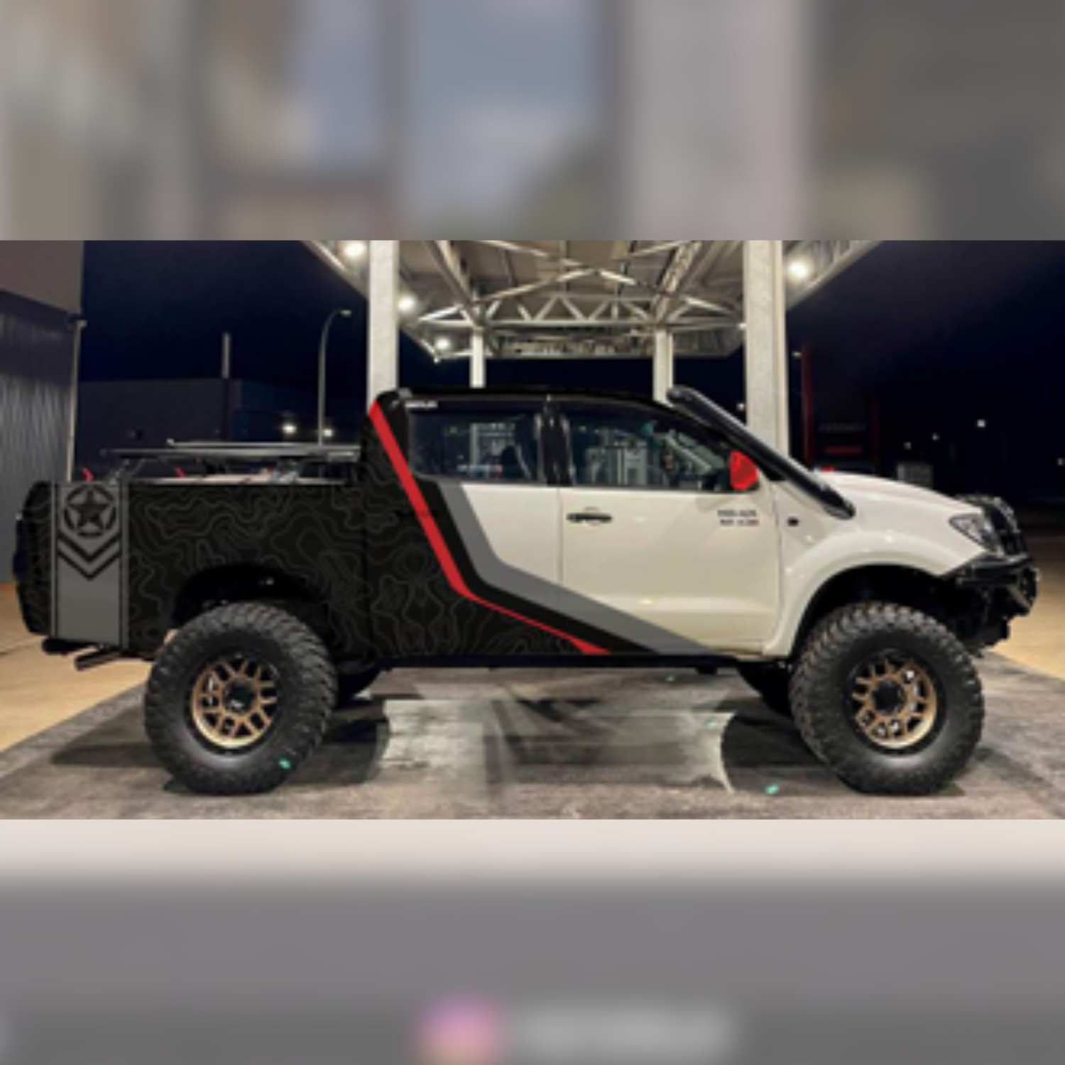 Custom SUV side graphics decals in black and red design for enhanced vehicle aesthetics