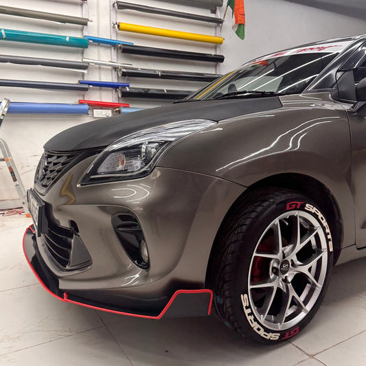 Suzuki front and side splitters on a modified car showcasing sleek design and enhanced aerodynamics