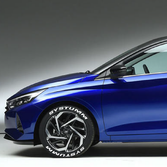 SYSTUMM permanent tyre stickers kit applied on a blue car with stylish rims