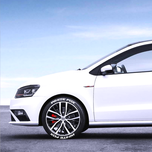 White Fox Car Tyre Stickers on a stylish white hatchback with sporty alloy wheels